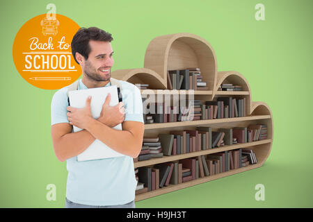 Zusammengesetztes Bild des Schülers mit laptop Stockfoto
