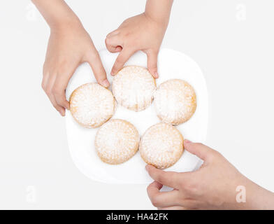 Hände mit cookies Stockfoto