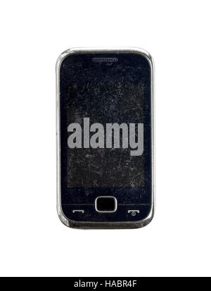 sehr alte verkratzte Handy, isoliert auf weiss Stockfoto