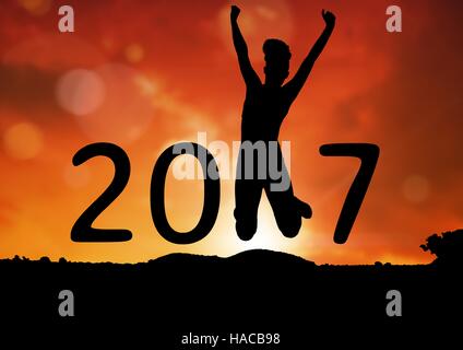 Silhouette der Person bilden 2017 Neujahr Zeichen springen Stockfoto