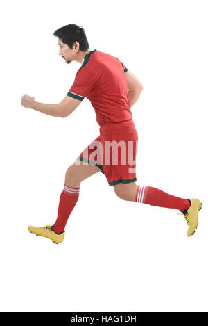 Bild des asiatischen Fußball-Spieler auf weißem Hintergrund läuft Stockfoto