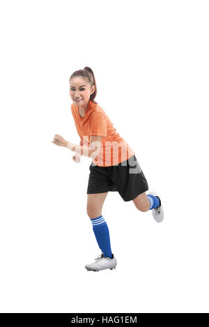 Bild des weiblichen Fußballer läuft isoliert auf weißem Hintergrund Stockfoto