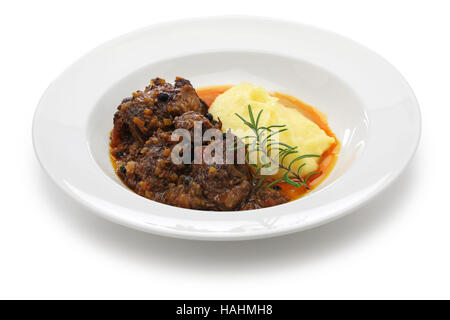 liegende mit Polenta, gespickt toskanischen Rindfleisch-Eintopf, traditionelle italienische Küche Stockfoto