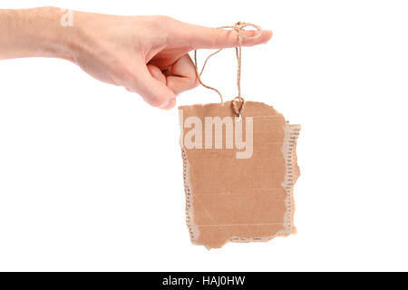 Karton-Tag am Finger hängen Stockfoto