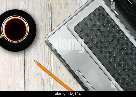 Laptop und Kaffee Tasse auf Holztisch Stockfoto