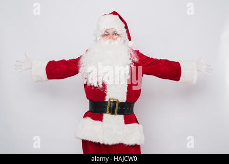 Santa Claus einladend mit offenen Händen Portrait Stockfoto