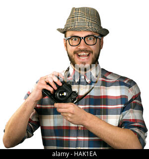 lustige Fotograf mit Retro-Kamera isoliert auf weiss Stockfoto