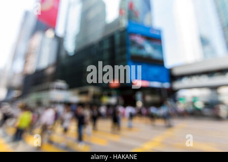 Verschwommene Fußgänger im Central Business District von Hong Kong - unscharf gestellt Stockfoto