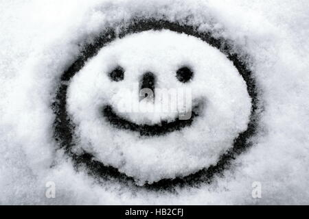 gemalt im Schnee, Smiley Stockfoto