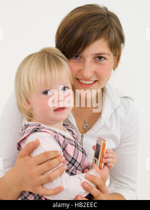 Junge Mutter mit ihrer Tochter Stockfoto