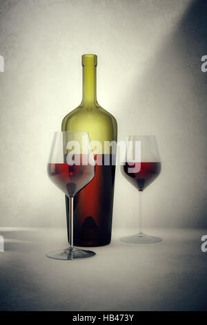 Flasche mit zwei Gläser Rotwein Stockfoto