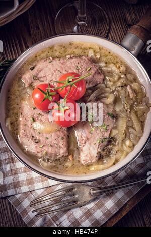 Gebratene Edward mit Zwiebel Stockfoto