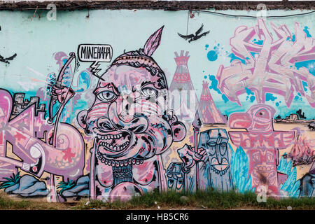 Street Art an einer Wand in Yogyakarta. Die Street Art in Yogyakarta hat oft eine politische Botschaft. Java, Indonesien. Stockfoto