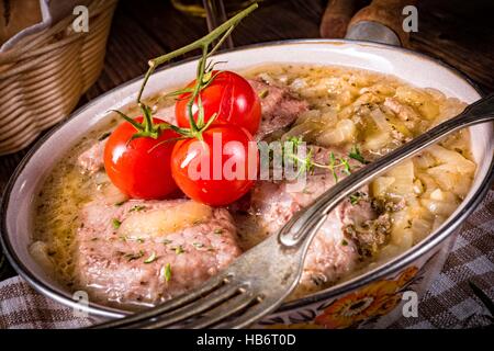 Gebratene Edward mit Zwiebel Stockfoto