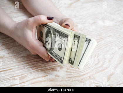 Dollar in Händen Stockfoto