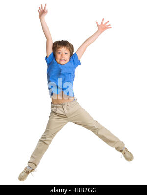 Kleiner Junge isoliert auf weiss springen Stockfoto