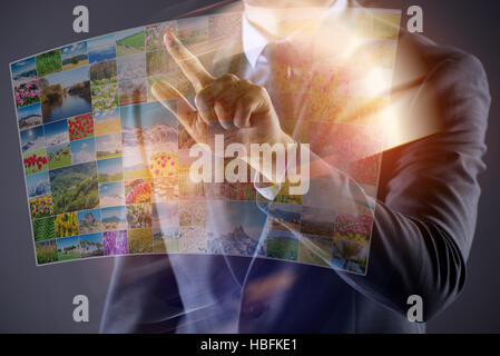 Mann, die Tasten mit Naturfotos Stockfoto