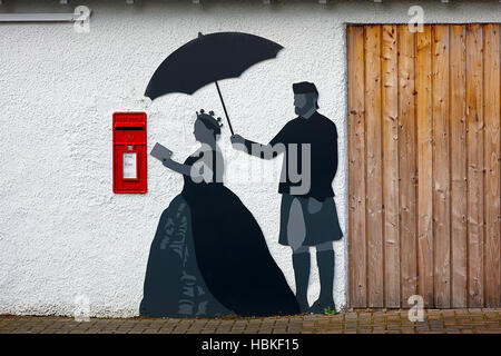 Königin Victoria mit Mann servent John Brown abbildenden Beitrag schreiben. Stockfoto