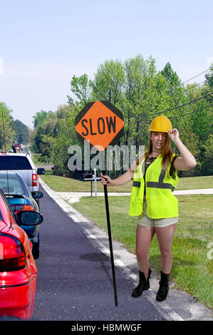 Arbeiter mit Stop-Schild Stockfoto