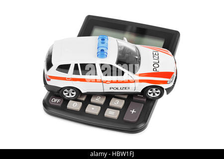 Rechner und Spielzeug Polizeiauto Stockfoto