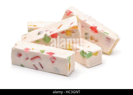 Obst-Nougat-Sticks isoliert auf weiss Stockfoto