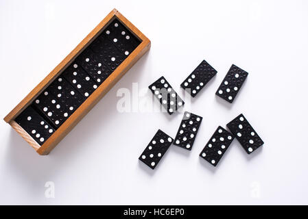 Domino auf weiße Fläche Stockfoto