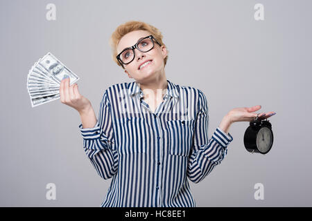 Sie müssen wählen zwischen Geld und Zeit Stockfoto