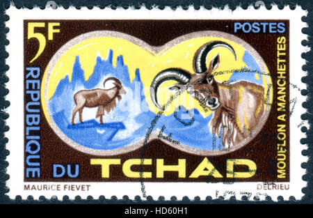 Tschad - ca. 1965: Eine Briefmarke gedruckt im Tschad, zeigt der Mähnenspringer (Ammotragus Lervia), ca. 1965 Stockfoto