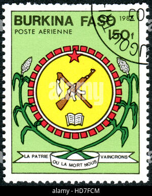 BURKINA FASO - ca. 1985: Eine Briefmarke gedruckt in Burkina Faso, zeigt das Wappen, ca. 1985 Stockfoto
