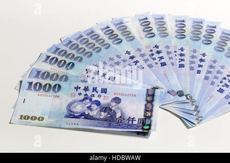 NT-Dollar in ein Fan auf weißem Hintergrund Stockfoto
