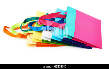 Haufen von bunten einkaufen oder Geschenk Taschen über dem weißen Hintergrund isoliert Stockfoto