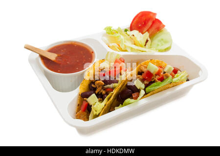 Taco wegnehmen Mahlzeit in einer Box isoliert auf weiß Stockfoto