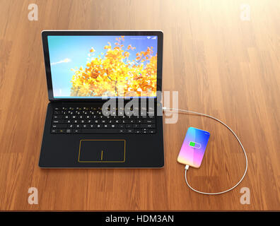 Smartphone Aufladen von Laptop-Computer. 3D-Rendering Bild. Stockfoto