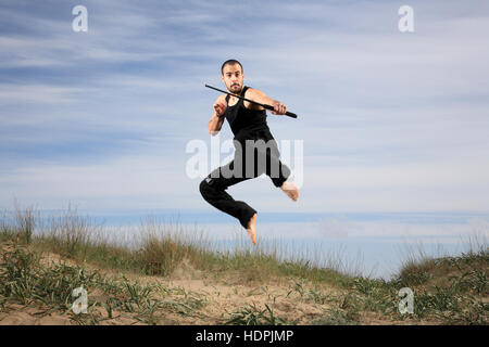 junger Mann aus Special Forces Training im freien Bewegung verwischen Stockfoto