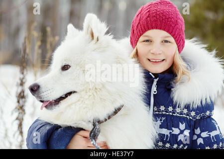 Samojede husky mit Besitzer Stockfoto