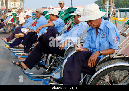 Cyclo-Fahrer in Hoi an, Vietnam Stockfoto