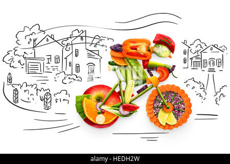 Gesunde Ernährung-Konzept eines Radfahrers mit dem Fahrrad von frischem Gemüse und Früchten, auf skizzenhafte Hintergrund gemacht. Stockfoto