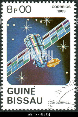 GUINEA - BISSAU - ca. 1983: Eine Briefmarke gedruckt in Guinea-Bissau, zeigt die Telekommunikationssatelliten, ca. 1983 Stockfoto