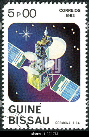 GUINEA - BISSAU - ca. 1983: Eine Briefmarke gedruckt in Guinea-Bissau, zeigt die Telekommunikationssatelliten, ca. 1983 Stockfoto