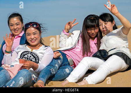 Chinesische Touristen, Sand Lake, Shizuishan, Ningxia, China Stockfoto