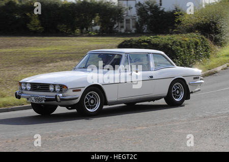 Weiße Triumph Stag Hardtop tracking Aktion erschossen Stockfoto