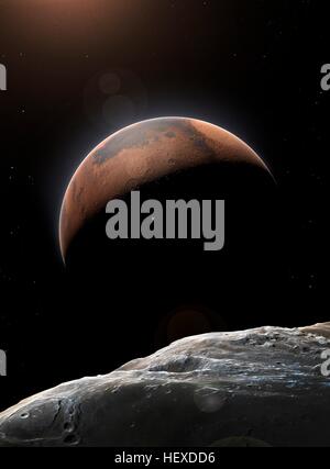 Einen Eindruck von den roten Planeten, Mars, der zweitkleinste Planet im Sonnensystem (nach Merkur). Seine äußerste Mond Deimos, sieht man im Vordergrund. Stockfoto