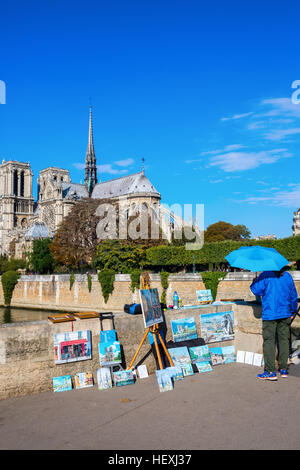 Streetart-Künstler mit Gemälden in der Nähe von Notre Dame, Paris, Frankreich Stockfoto