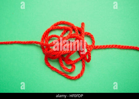 Oberursel, Deutschland. 25. November 2016. Symbolisches Bild eines roten Fadens, aufgenommen am 25.11.16 in Oberursel | Nutzung weltweit © Dpa/Alamy Live-Nachrichten Stockfoto