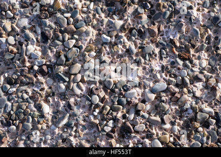 Hintergrund mit Kieselsteinen und kleinen Steinen. Full-Frame. Stockfoto