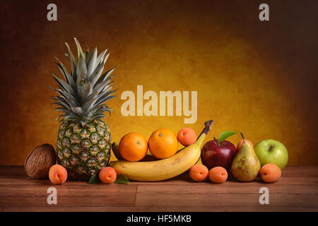 assorted fruits on the wooden table Stockfoto