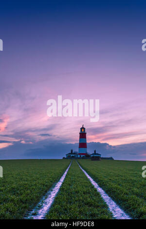 Happisburgh Leuchtturm an der Küste von North Norfolk ist der einzige unabhängig betriebene Leuchtturm in Großbritannien. Stockfoto