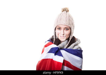 Glückliche Frau halten britische Flagge. Isoliert auf weiss Stockfoto