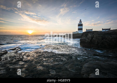 Hook Head Lighthouse in County Wexford, Irland, bei Sonnenuntergang Stockfoto