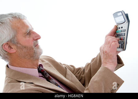 Älteren Geschäftsmann mit Taschenrechner Stockfoto